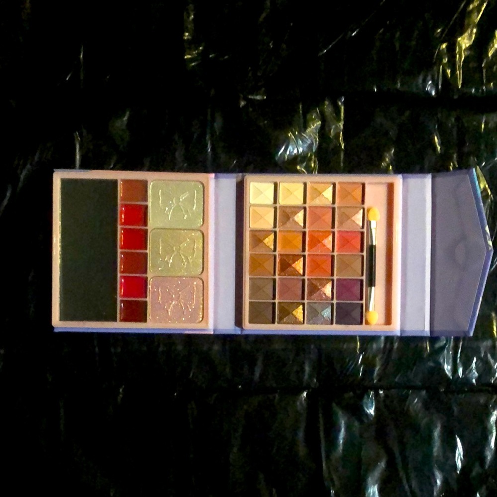 Pink and purple compact makeup kit